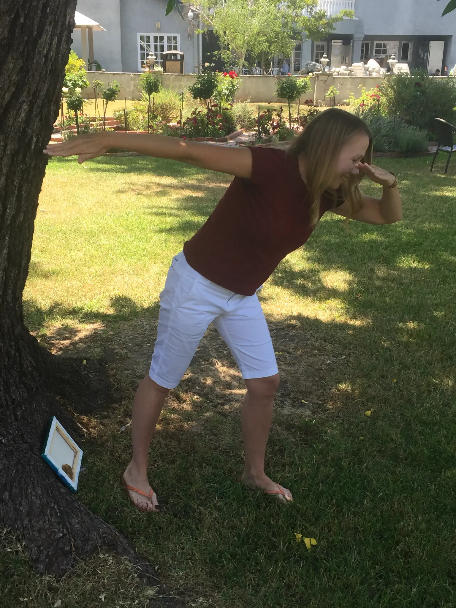 Kristen celebrating 30 days sober in the garden at Harmony Place
