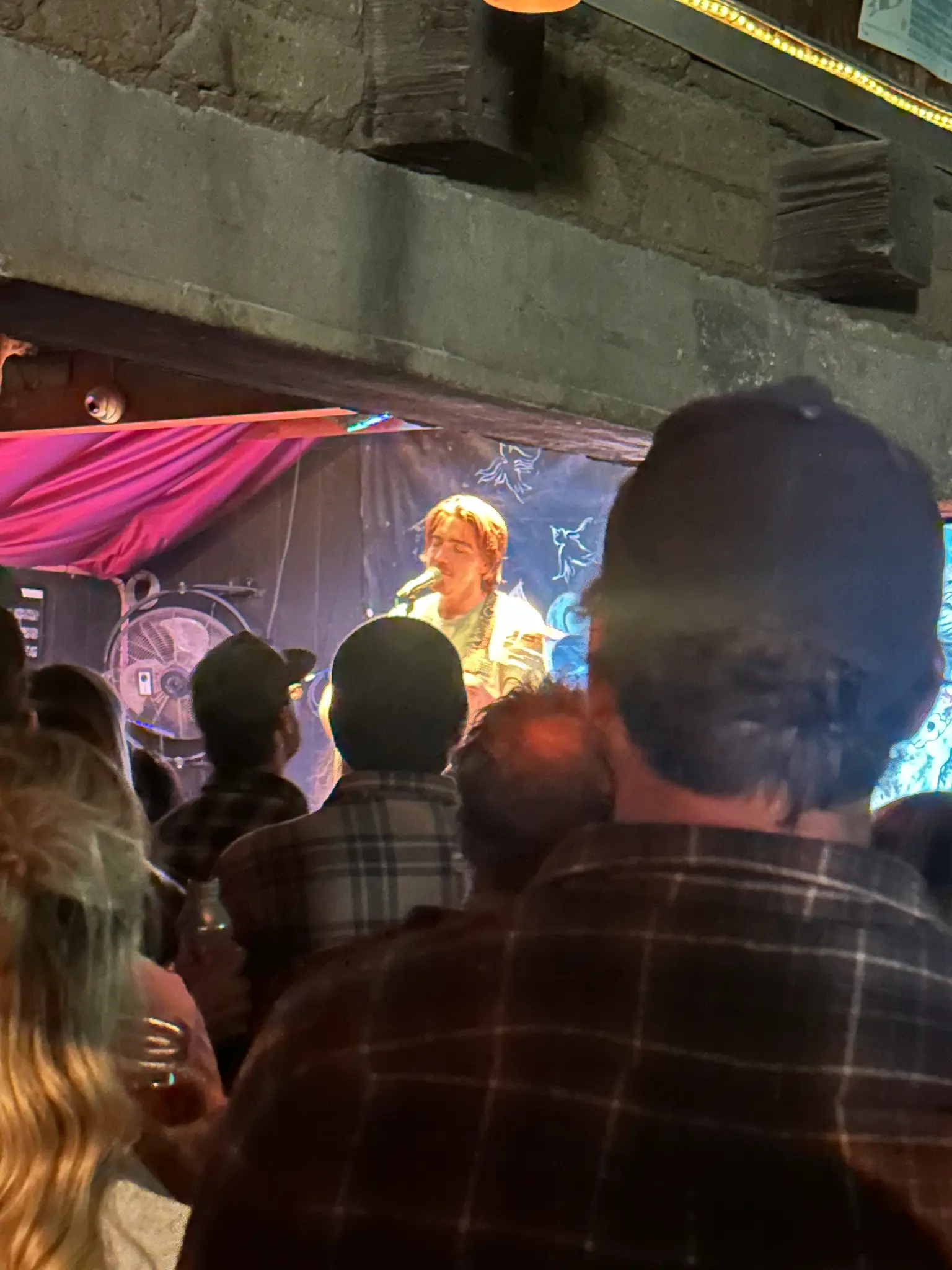 Ryan Harris performing live on stage at Pappy and Harriet's in Pioneertown